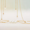 Porter pareloorhangers, geelgoud, zoetwaterparels